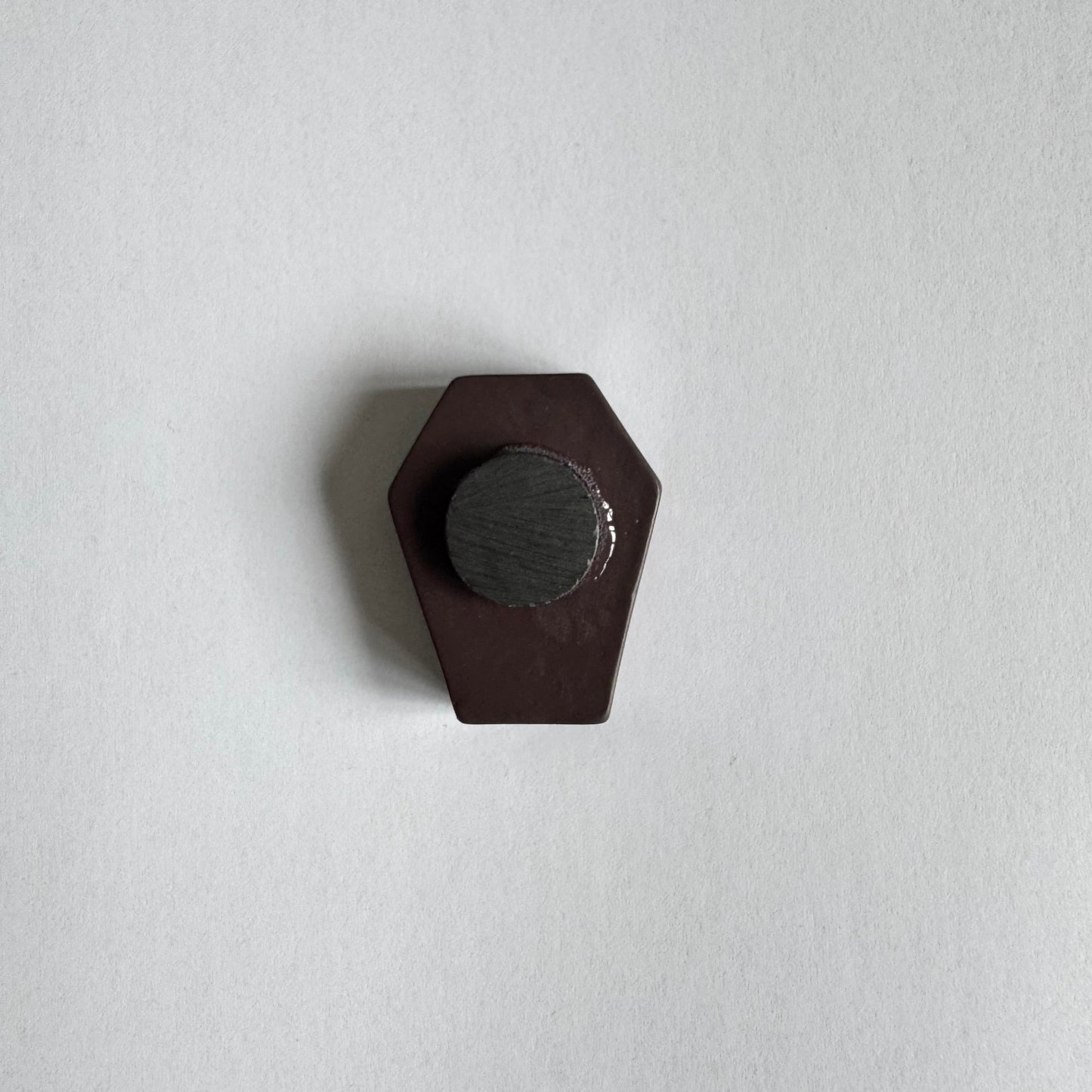 back of a coffin shaped magnet